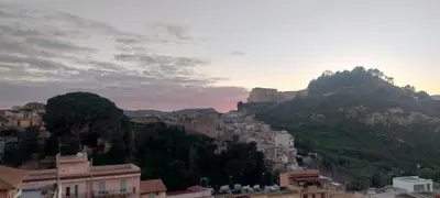 a view of a town on a mountain at Piccolo Sole d'oro - appartamenti in Calatafimi