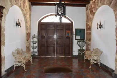 a kitchen with a table and a kitchen with a tableablish at Anna's Home in Historical Center in Palermo