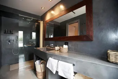 a bathroom with a sink and a mirror at Casa Nostra Boutique Hotel & Spa in Palermo
