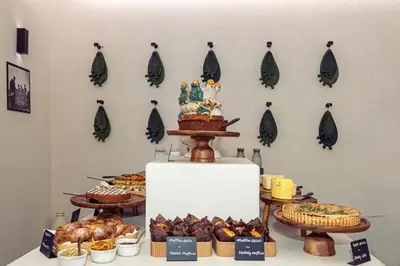 a table with different types of pastries and desserts at Casa Nostra Luxury Suites & Spa in Palermo