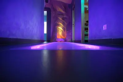 an empty room with purple lights on the floor at Bellevue del Golfo Hotel & Spa in Sferracavallo