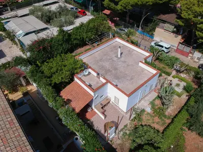 an overhead view of a house with a roof at Isabel House in Isola delle Femmine