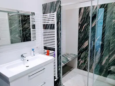 a bathroom with a sink and a shower at Palazzo del Golfo in Castellammare del Golfo