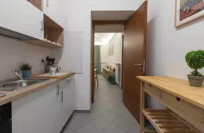 a kitchen with a sink and a counter top at H Urban in Palermo
