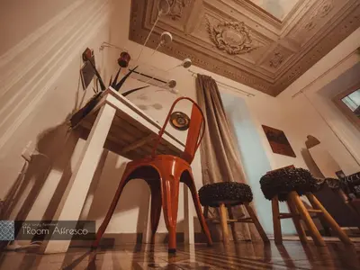 a high heel shoe sitting on top of a piano at CITRUS LUXURY APARTMENT - holiday apartment with up to 3 bedrooms in palermo center in Palermo