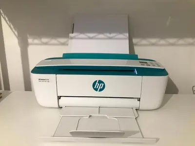 a hp printer sitting on top of a table at CITRUS LUXURY APARTMENT - holiday apartment with up to 3 bedrooms in palermo center in Palermo