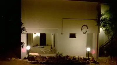 a living room with a couch and a mirror at Il Volo Dei Gabbiani in Scopello