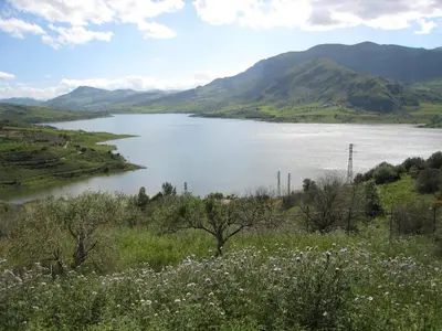 a view of a lake with mountains in the background at Casa Vacanze Caccamo Santa Lucia in Caccamo