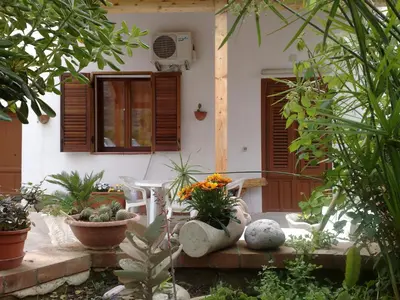 a house with some plants in front of it at VILLA BUTTERFLY 1 sea and history in Capaci