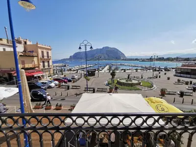 a view of a city from a balcony at Mondello Vista Mare in Mondello