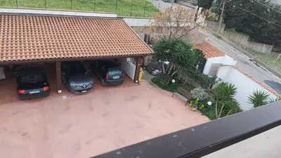 an overhead view of two cars parked in a garage at Costapicca in Alcamo