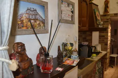 a kitchen with a counter with some items on it at Casa Del Vicolo Apartament in Palermo