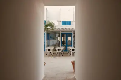a view of a room with tables and chairs at Hotel Tannure in San Vito lo Capo