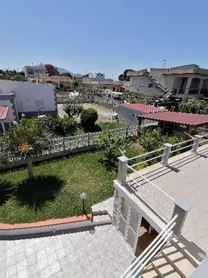 an aerial view of a city with a park at Villa Giulia in Alcamo Marina