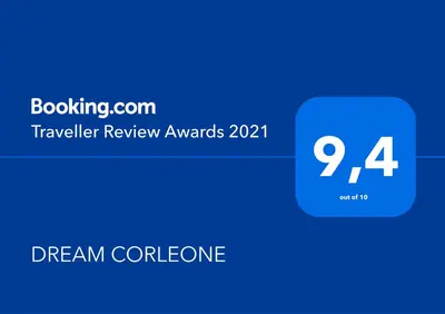 a blue box with the text travel review awards at DREAM CORLEONE in Corleone