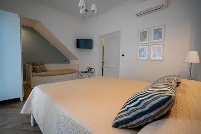 a bedroom with a bed with a pillow on it at Casa Novelli Apartments in Monreale