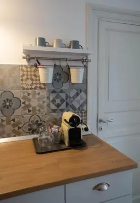 a kitchen counter with a toaster on top of it at Casa Novelli Apartments in Monreale
