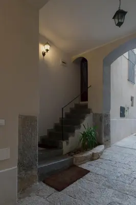 a stairway in a building with a stair case at Rooms 19 - Rooms and Breakfast in Palermo