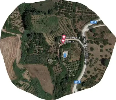 a map of a park with a red marker at Egesta, villa with private pool in Calatafimi