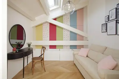 a living room with a couch and a table at La Kalsa Charming Maison in Palermo