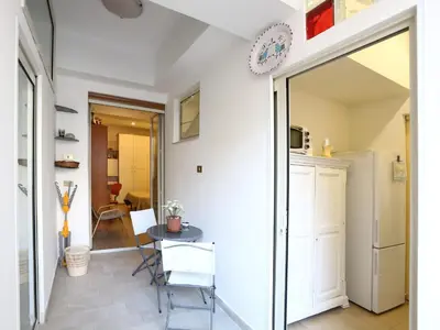 a small dining room with a table in a room at Plumeria/Libertà in Palermo