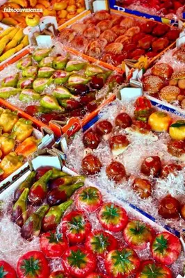 a display of different types of fruit in trays at Hostel Centro BASEMENT in Palermo