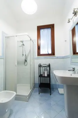 a bathroom with a shower and a toilet and a sink at Villa Caterina Scopello in Scopello
