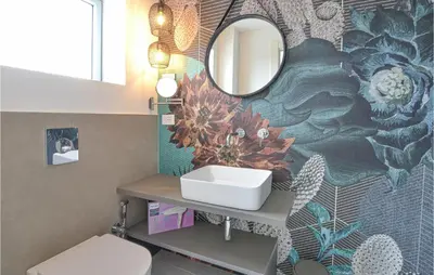 a bathroom with a sink and a mirror at Stunning Home In Balestrate in Balestrate