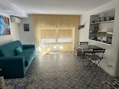 a kitchen with a sink and a counter top at Duba House Holiday Home in Palermo
