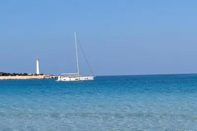 a sailboat in the middle of a body of water at Villa Mendez in Castellammare del Golfo