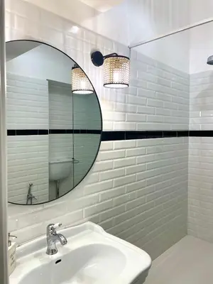 a bathroom with a sink and a mirror at Charmie flat in Palermo