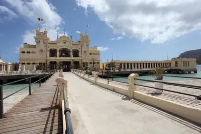 a building on a bridge over a body of water at Alfredo Apartment a casa di alfredo in Palermo