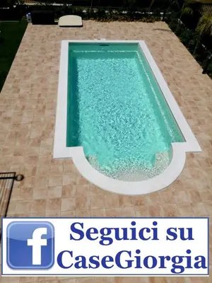 a swimming pool with a sign in front of it at Villa Giorgia 2020 in Cefalù