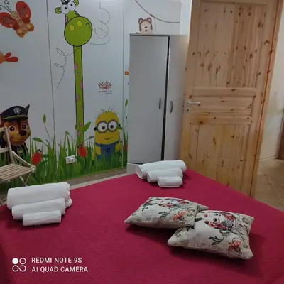 a room with a bed with two pillows on it at Baglio Cracchiolo da Tuzzo - Casa Il Limone in San Vito lo Capo