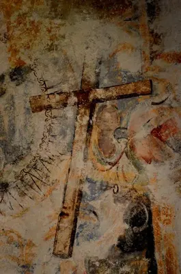 a painting of a cross on a wall at Agriturismo Masseria La Chiusa in San Giuseppe Jato