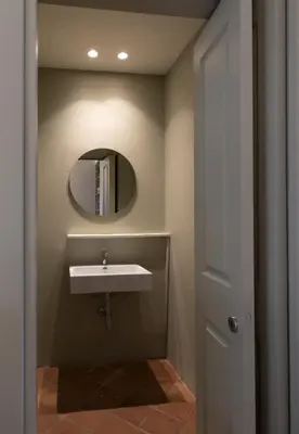 a bathroom with a sink and a mirror at Villa Turchese sul mare in San Vito lo Capo