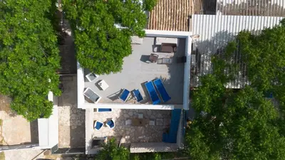 an overhead view of a house with a swimming pool at Villa Azzurra a pochi passi dal mare in San Vito lo Capo