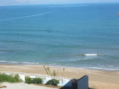 a view of a beach with the ocean at LA FINESTRA SUL MARE in Trappeto