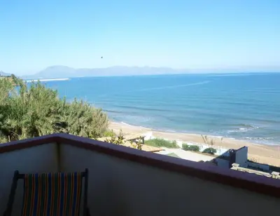a view of the ocean from a balcony at la finestra sul mare piano 2 in Trappeto
