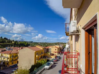 a view of a city street from a building at Apartment SinAgo by Interhome in Lascari
