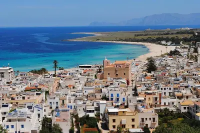 an aerial view of a town with a beach at Villa Smeralda in San Vito lo Capo
