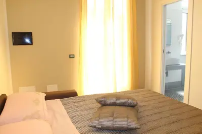 a room with a table with a pillow on it at Sicilia d'Amare in Capaci