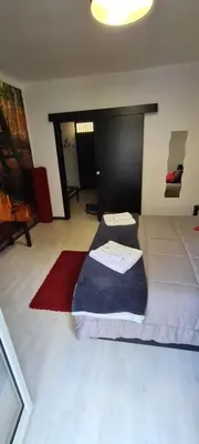 a bedroom with a bed in the middle of a room at Virginia House 2 in Palermo
