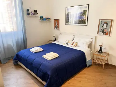 a room with white cabinets and a fire extinguisher at Lucky Inn, La Locanda della Fortuna in Palermo