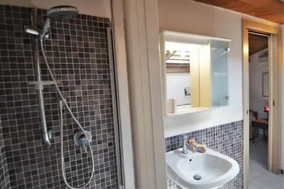 a bathroom with a sink and a shower at Villa Mirage in Alcamo