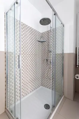 a shower with a glass enclosure in a bathroom at il sogno di Saffo in Palermo