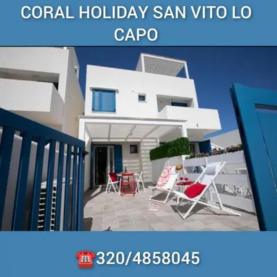 a rendering of a house with chairs and a patio at Coral Holiday San Vito Lo Capo in San Vito lo Capo