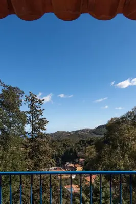 a view of the mountains from the balcony of a house at La Casa nell'Oliveto a San Martino in Monreale