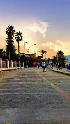 a group of people walking down a street at Casa gianflò in Palermo