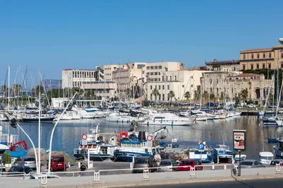 a marina with lots of boats in the water at Camera Vento Porto Antico La Cala in Palermo